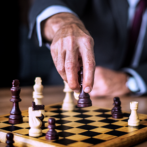 Man playing chess with remote invigilation
